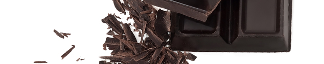 Dark chocolate and trimmings (closeup)